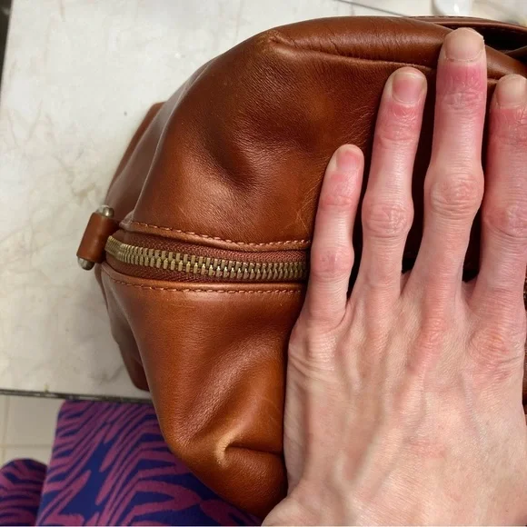 Always limited edition brown leather duffle bag unisex
